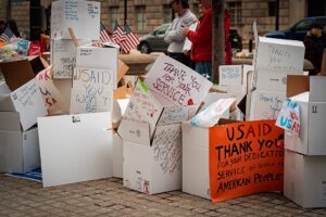 In 2025, the Trump administration moved to dismantle USAID as part of its "America First" agenda, disrupting global humanitarian and development aid. Image source: Ted Eytan from Washington, DC, USA, CC BY-SA 2.0, via Wikimedia Commons. In 2025, the Trump administration moved to dismantle USAID as part of its "America First" agenda, disrupting global humanitarian and development aid. Image source: Ted Eytan from Washington, DC, USA, CC BY-SA 2.0, via Wikimedia Commons.