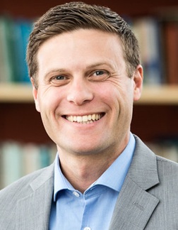 Dr Adam C. Levine